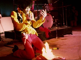 Jimi Hendrix Burning His Guitar on Stage